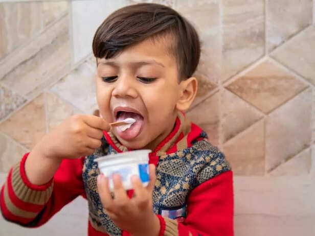 TODDLER EATING ICE-CREAM