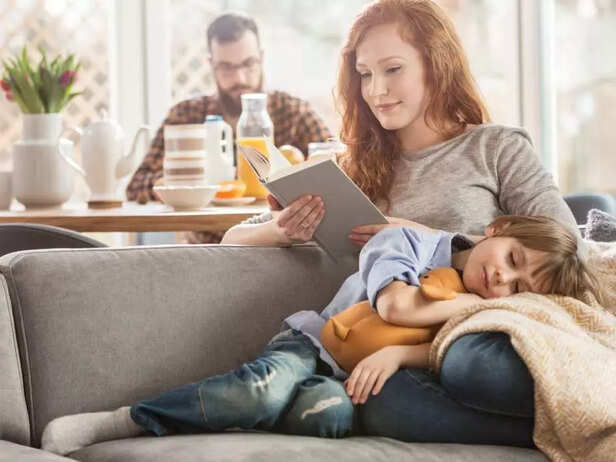 MOTHER READING A BOOK