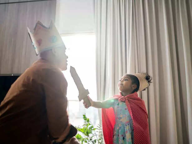 father and daughter playing drama