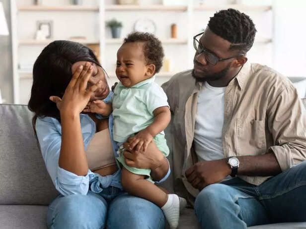 WOMAN WITH POSTPARTUM WITH HER HUSBAND