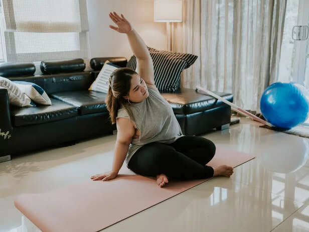 obese pregnant woman working out
