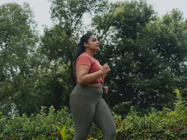 overweight woman jogging