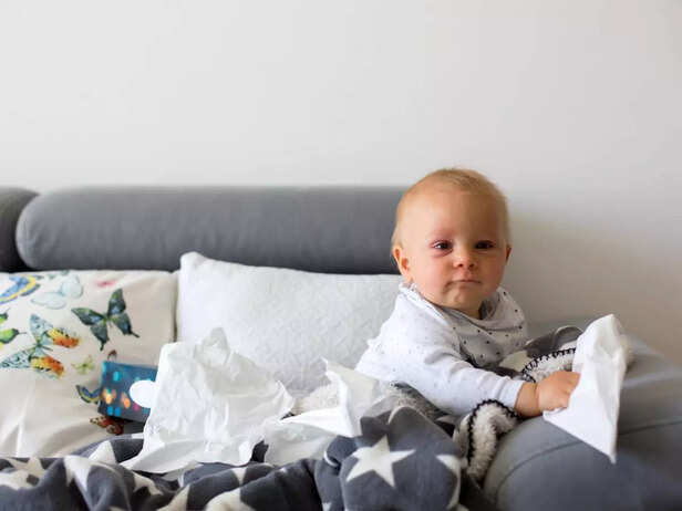 child trying to tear papers