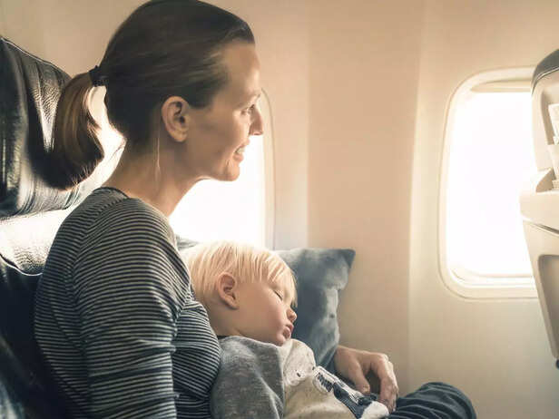 baby sleeping on flight