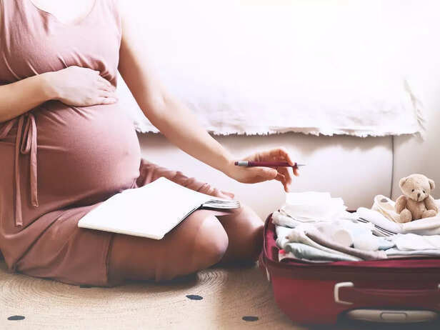 woman packing hospital bag