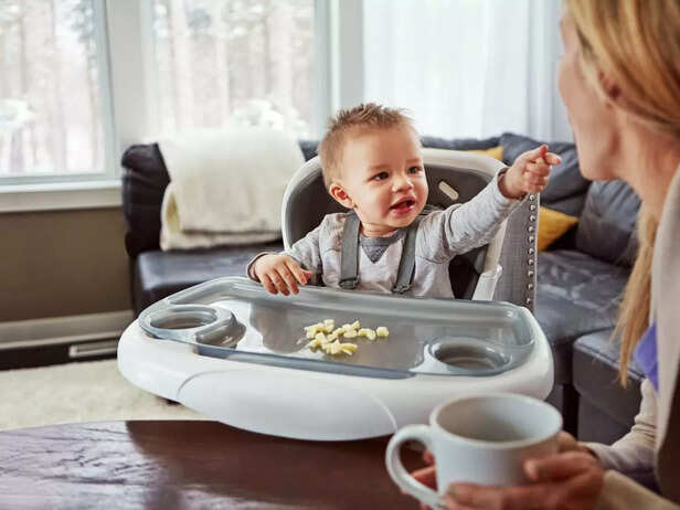 child sharing food with parent