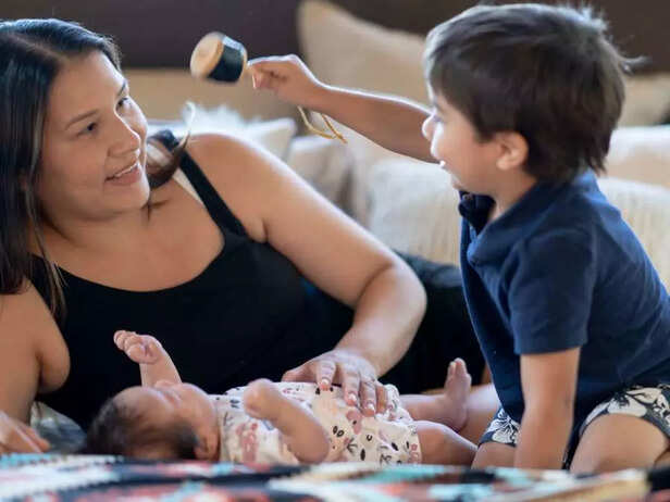 MOTHER TEACHING EMPATHY BETWEEN SIBLINGS