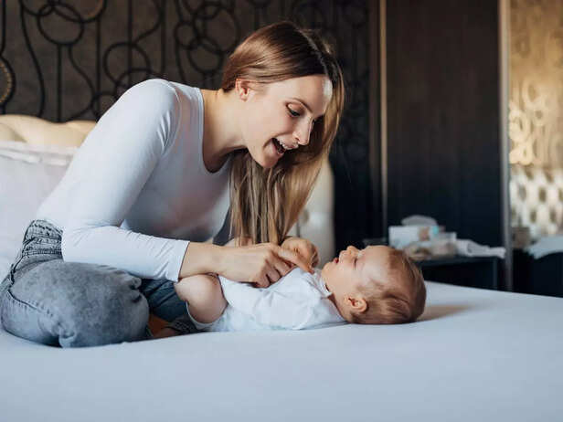 mother singing to child