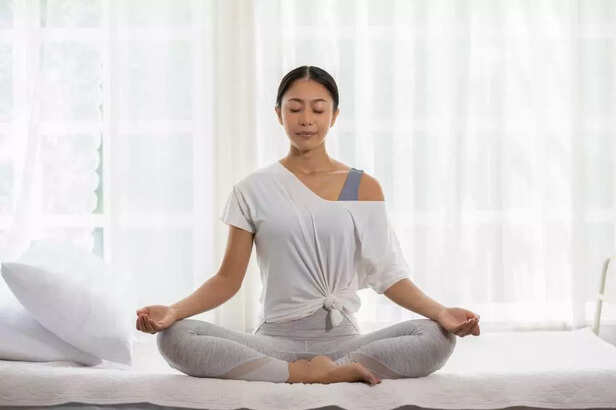 A woman practicing Yoga