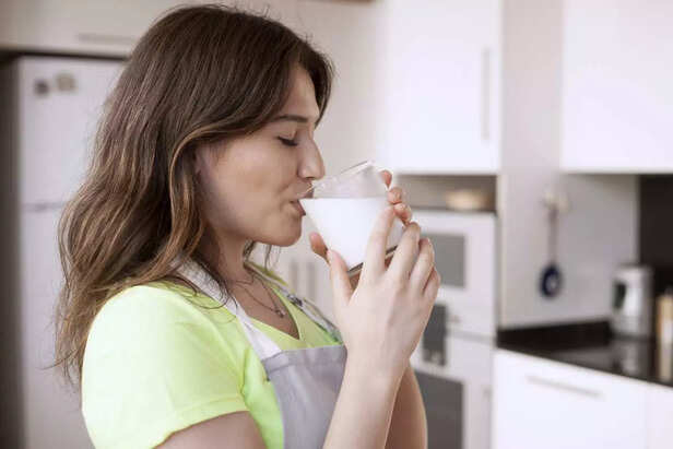 pregnant woman drinking milk