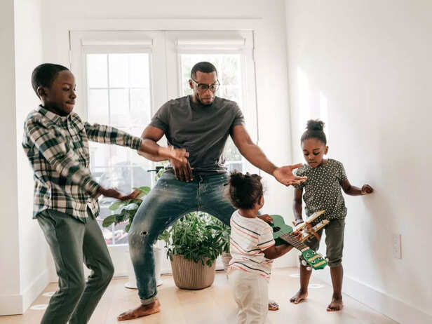 Children and parent dancing and having fun
