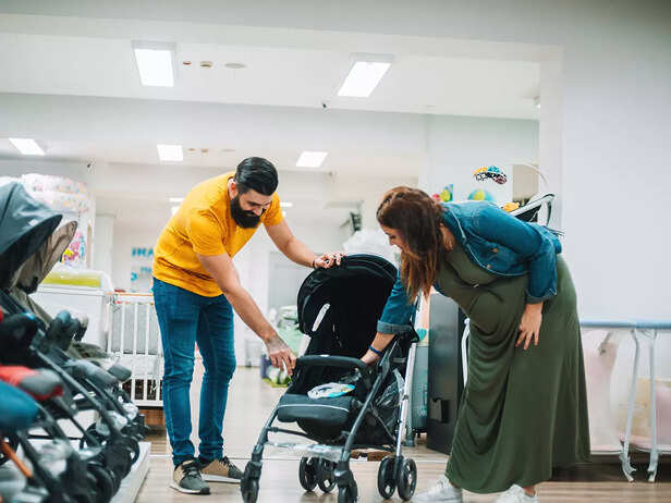 PARENTS SHOPPING FOR BABY STROLLERS