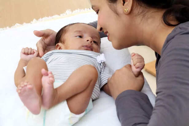 child looking at mother