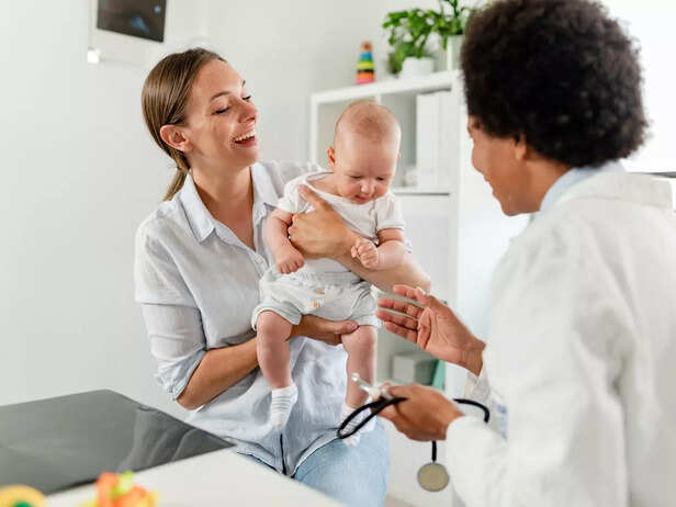 parent with child at paediatrician