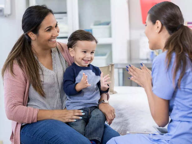 Parent with child visiting doctor
