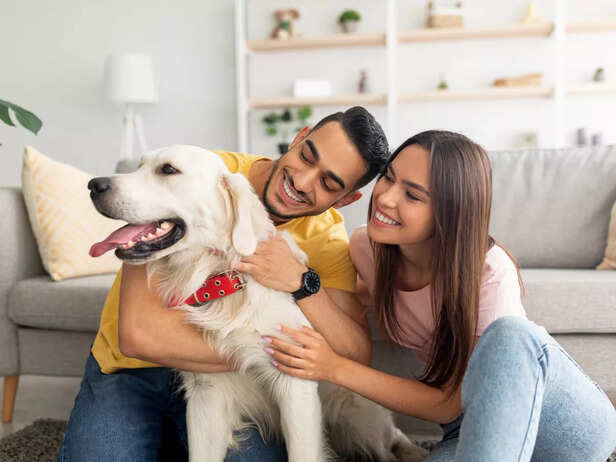happy couple with pet