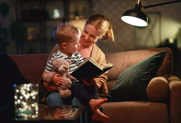 mother reading to toddler