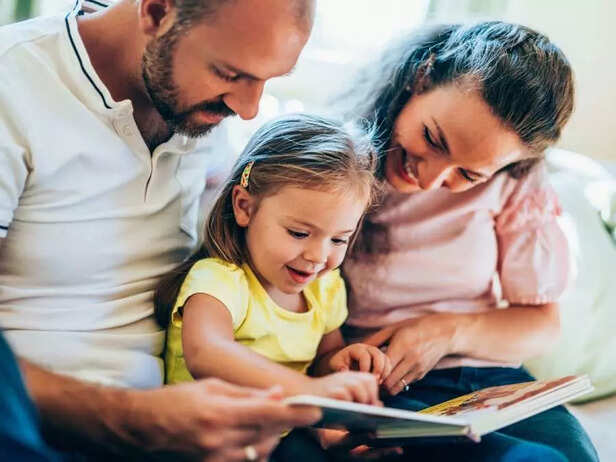 parents reading with child
