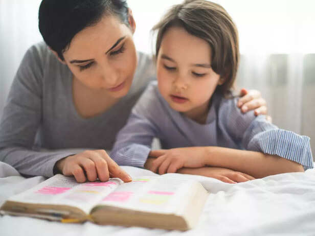 mother and daughter reading