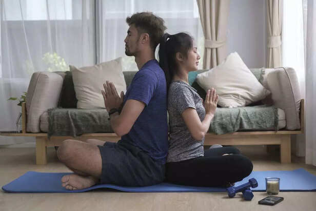 couple doing yoga together
