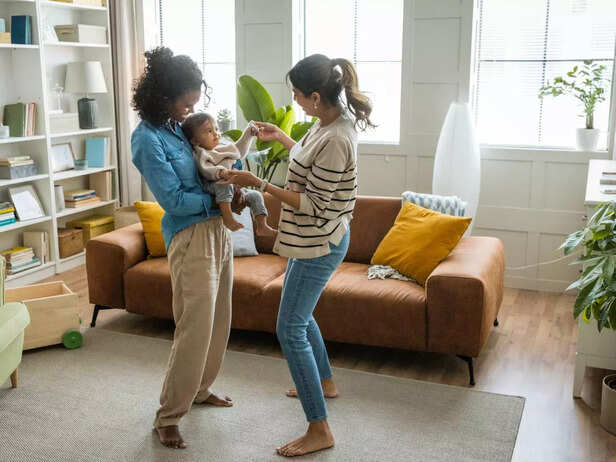 child and parent dancing