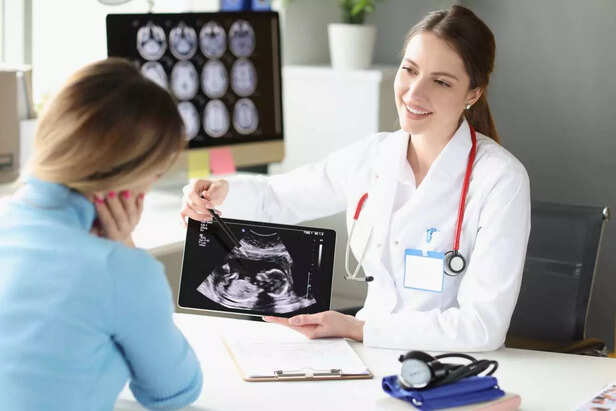 woman discussing with doctor