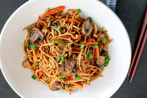 Vegetable Stir-Fried Noodles / Chow Mien in a White Bowl
