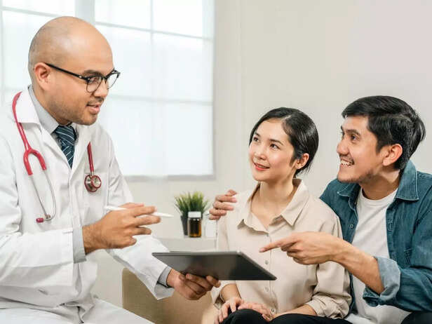 couple talking to doctor