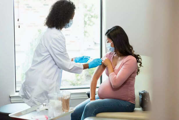 pregnant woman getting vaccination
