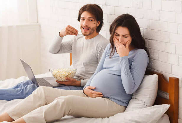 Pregnant woman feeling sick because of smell of popcorn