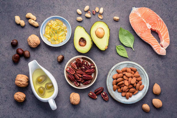 Selection food sources of omega 3 and unsaturated fats. Superfood high vitamin e and dietary fiber for healthy food. Almond ,pecan,hazelnuts,walnuts,olive oil,fish oil and salmon
