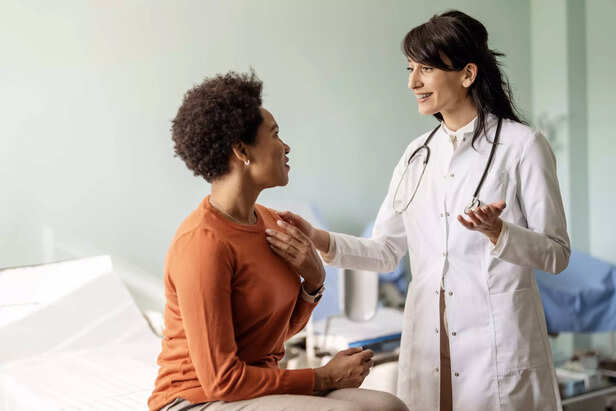 WOMAN TALKING TO A DOCTOR