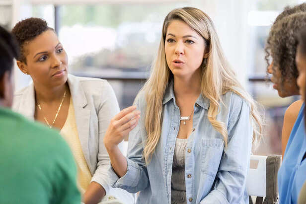 Vulnerable woman talks about issues with support group