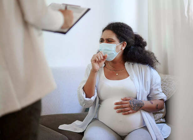 Sick and medical with pregnant woman and consulting for healthcare, pandemic and virus exam. Medicine, pregnancy and test with mother coughing at home for disease, diagnosis and treatment