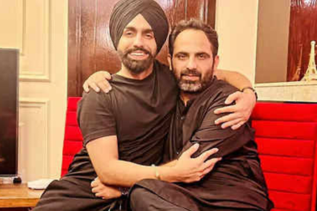 Poet Tehzeeb Hafi hugging Punjabi Celebrity Ammy Virk