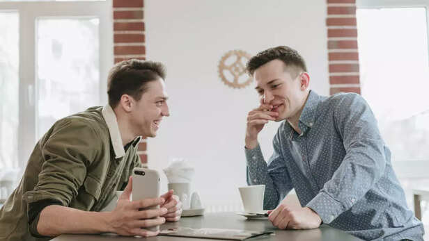 Two men indulging in a humorous conversation