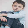 A Kid Sitting Alone