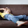 A Kid Lying on a Sofa