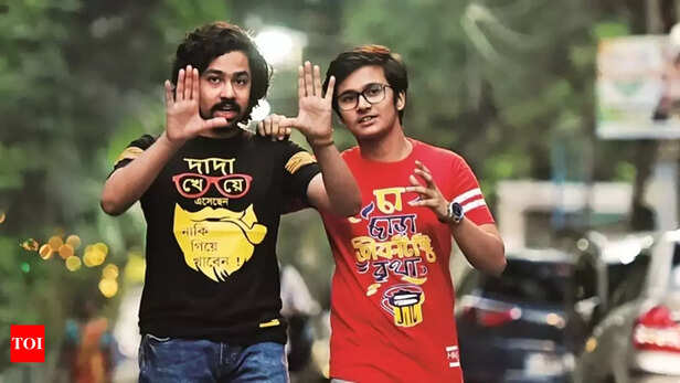 Two Boys Wearing T-shirts.