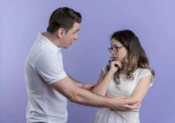 young-couple-man-girlfriend-asking-forgiveness