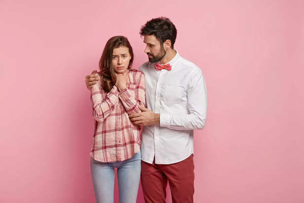 young-couple-wearing-colorful-clothes-min