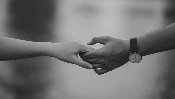 Hands hold