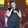 Louis Tomlinson Performing on Stage.