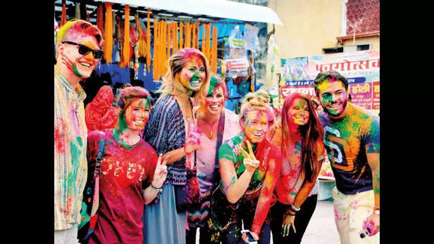 Foreigners enjoying holi celebration