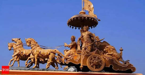 A statue of Arjuna and Krishna
