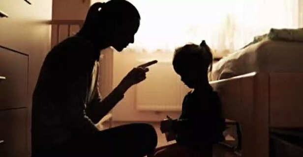 A mother scolding her child