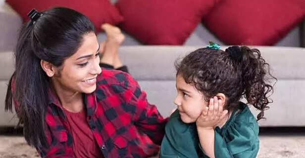 A mother and a daughter having a conversation