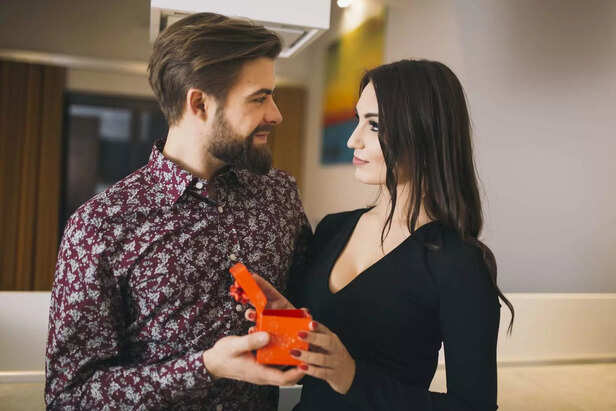 loving-couple-celebrating-holiday-home-min