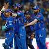 Mumbai Indians celebrating a wicket.