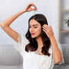 woman-doing-herself-scalp-massage